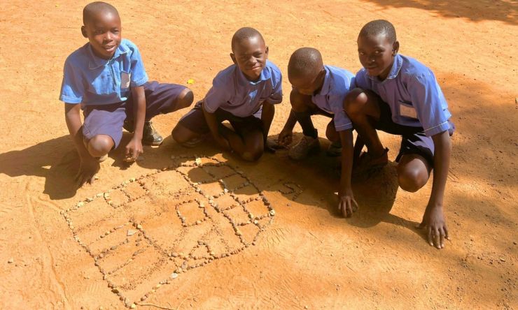 Playing with stones (1380 x 720 px) (1).jpg